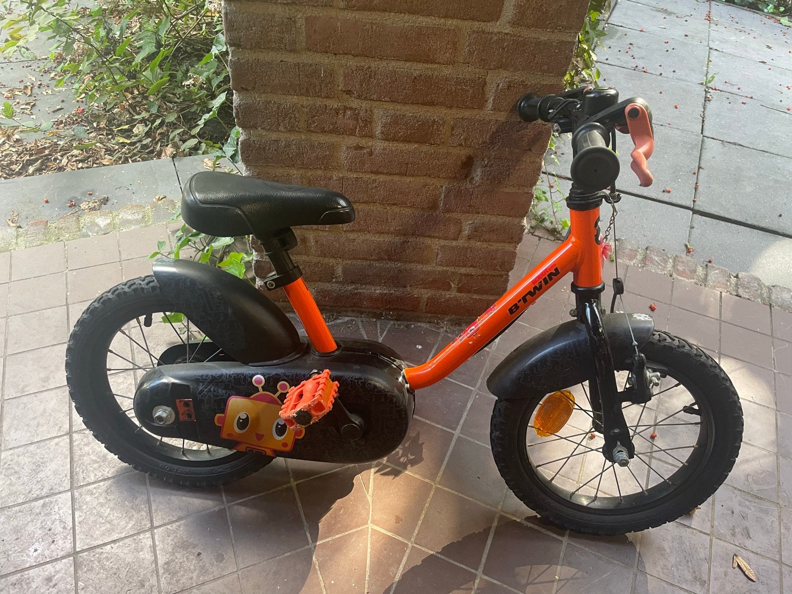 B'Twin 12 inch kinderfiets - Oranje, Ophalen, Gebruikt, Velgrem, Minder dan 16 inch