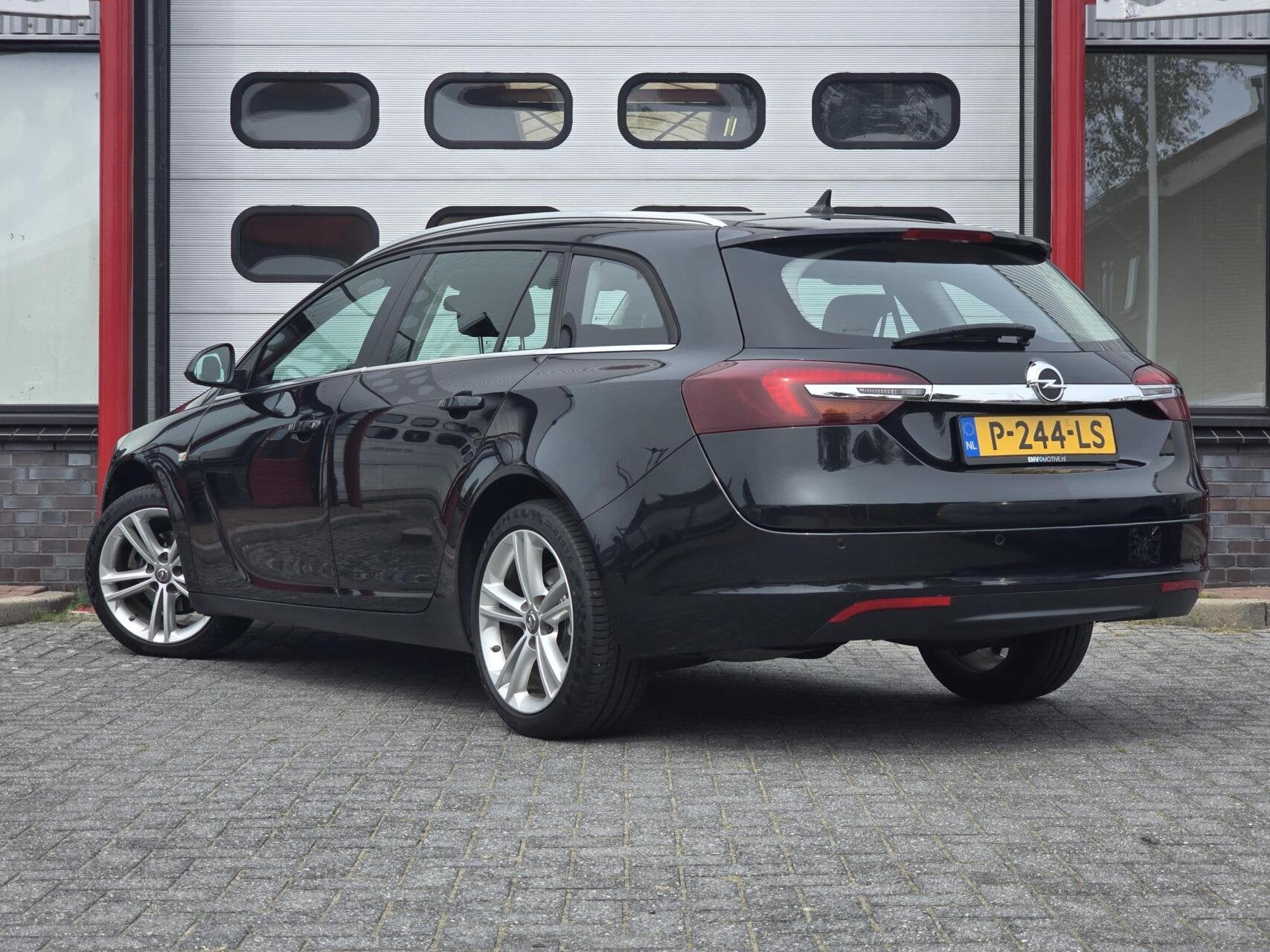 Opel Insignia Sports Tourer 1.4 T EcoFLEX Edition Xenon/Navi, Stof, Gebruikt, Zwart, Handgeschakeld