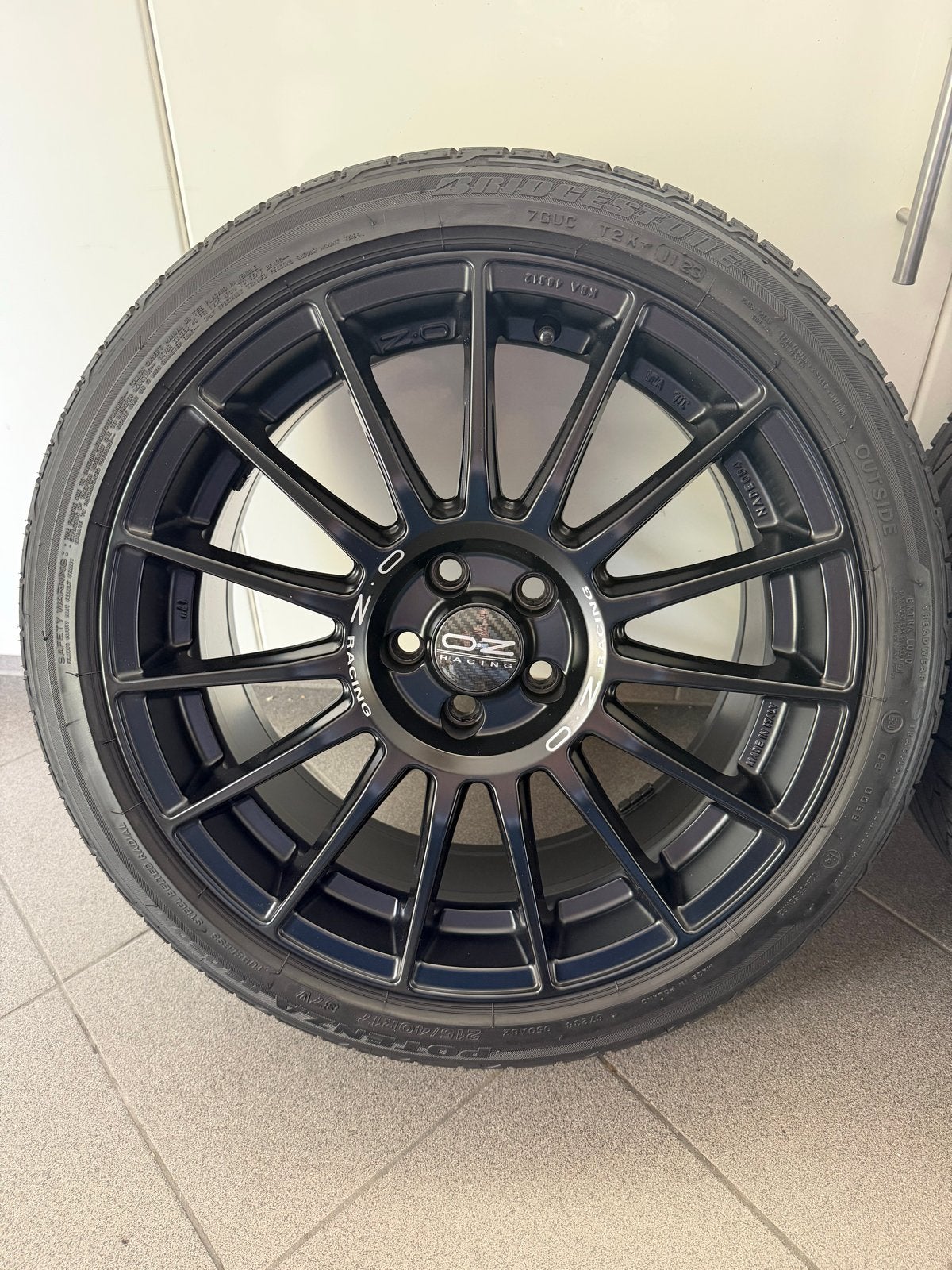 OZ Racing Superturismo mat zwart 17inch Bridgestone Potenza, Banden en Velgen, 17 inch, Ophalen of Verzenden, Personenwagen