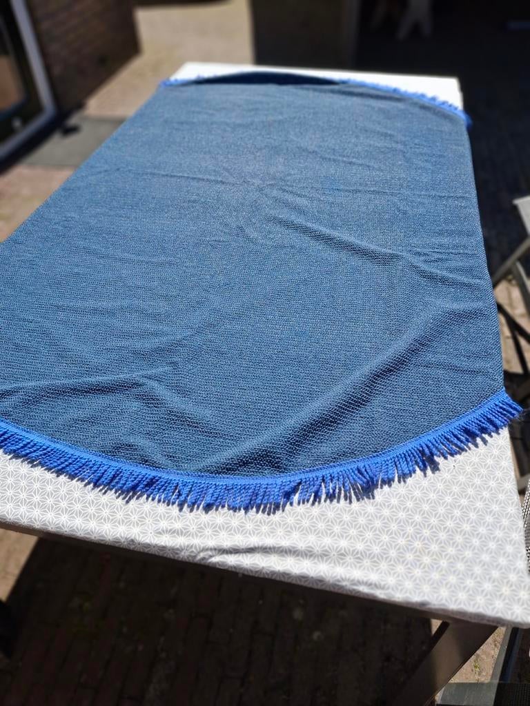 Blauw weerbestendig ovaal tafelkleed 65 cm lang, Ophalen of Verzenden, Gebruikt, Ovaal, Binnen