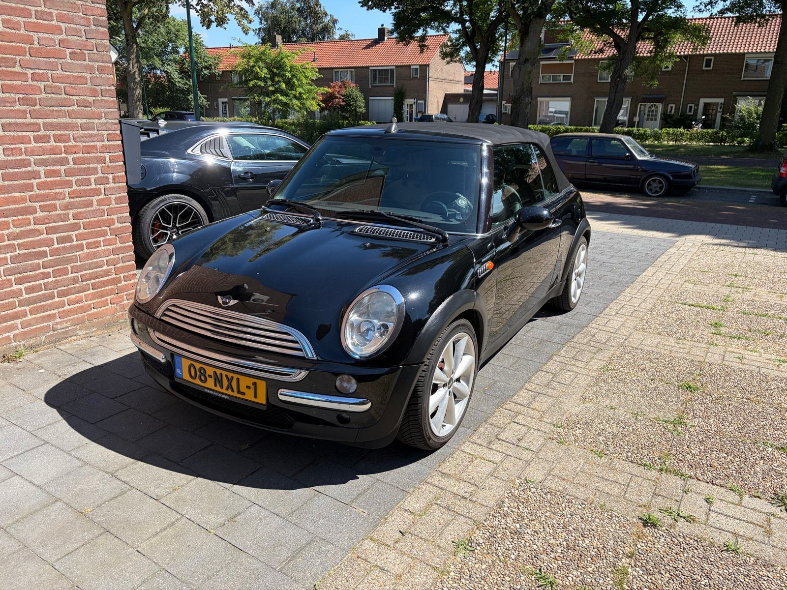 Mini 2005 Zwart 130000km, Auto's, Cabriolet, 4 stoelen, Zwart, 1175 kg