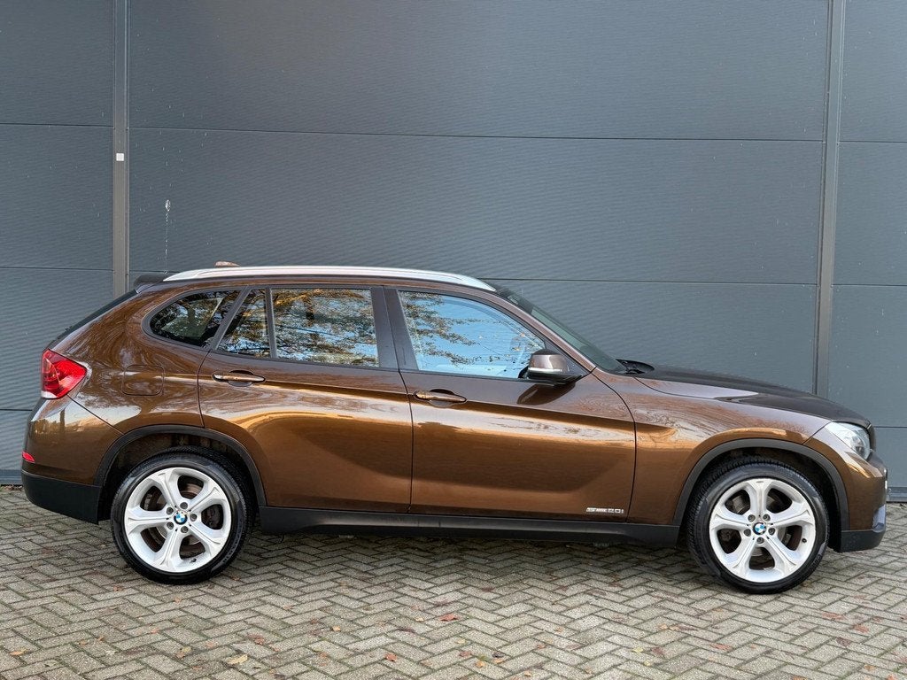 BMW X1 SDrive20i Executive NAVI CLIMA CRUISE TREKHAAK, Auto's, BMW, 4 cilinders, Bruin, Origineel Nederlands, 184 pk