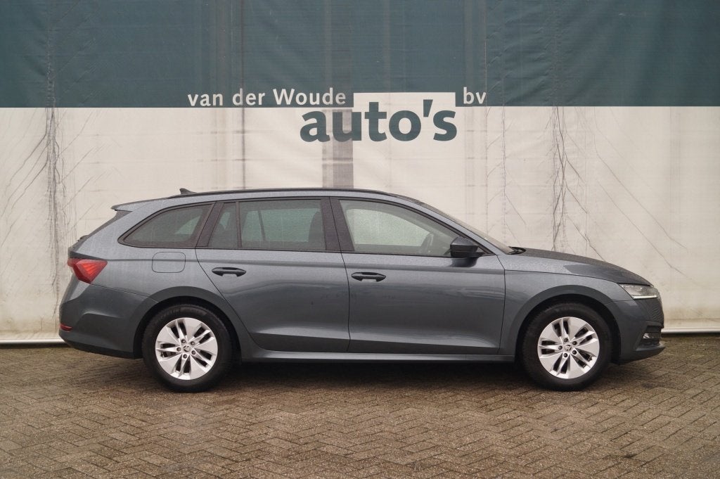 Skoda Octavia Combi 1.0 TSI 110pk DSG Business Edition -PANO, Auto's, Skoda, Stof, Gebruikt, Euro 6, Automatische klimaatregeling