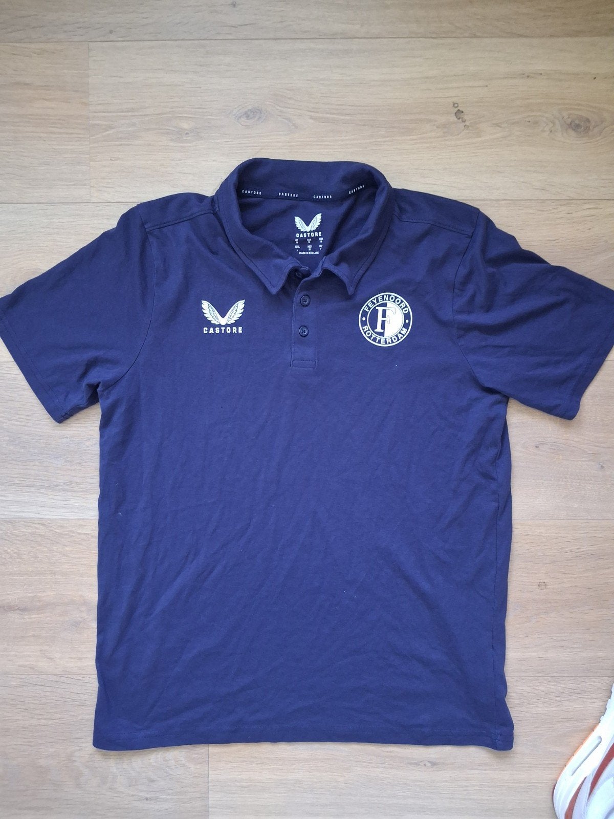 Feyenoord Castore Polo - Maat M - Zo goed als nieuw, Ophalen of Verzenden, Zo goed als nieuw, Maat 48/50 (M), Blauw