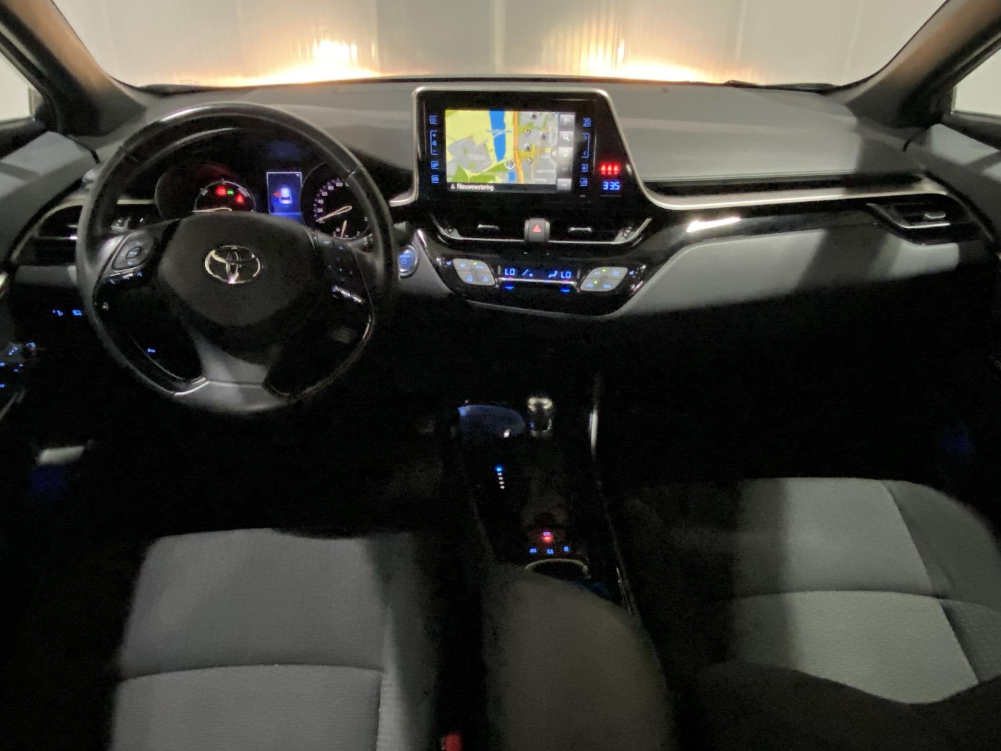 Toyota C-HR 1.8 Hybrid Style Navi Toyota garantie tot 2029!,, Auto's, Stof, Euro 6, 4 cilinders, 122 pk