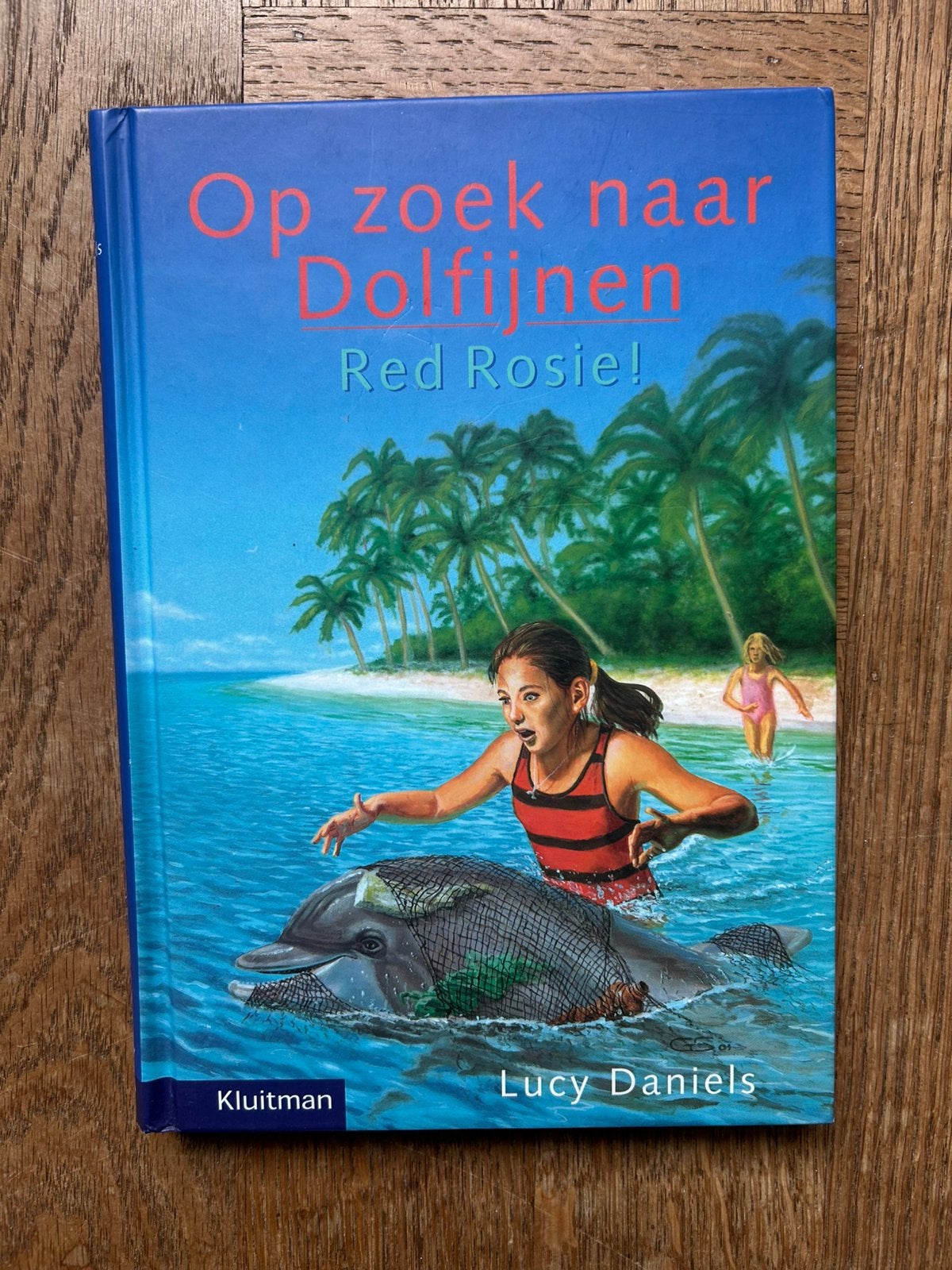 Op zoek naar dolfijnen - Red Rosie! Lucy Daniels Kinderboek, Ophalen of Verzenden, Zo goed als nieuw