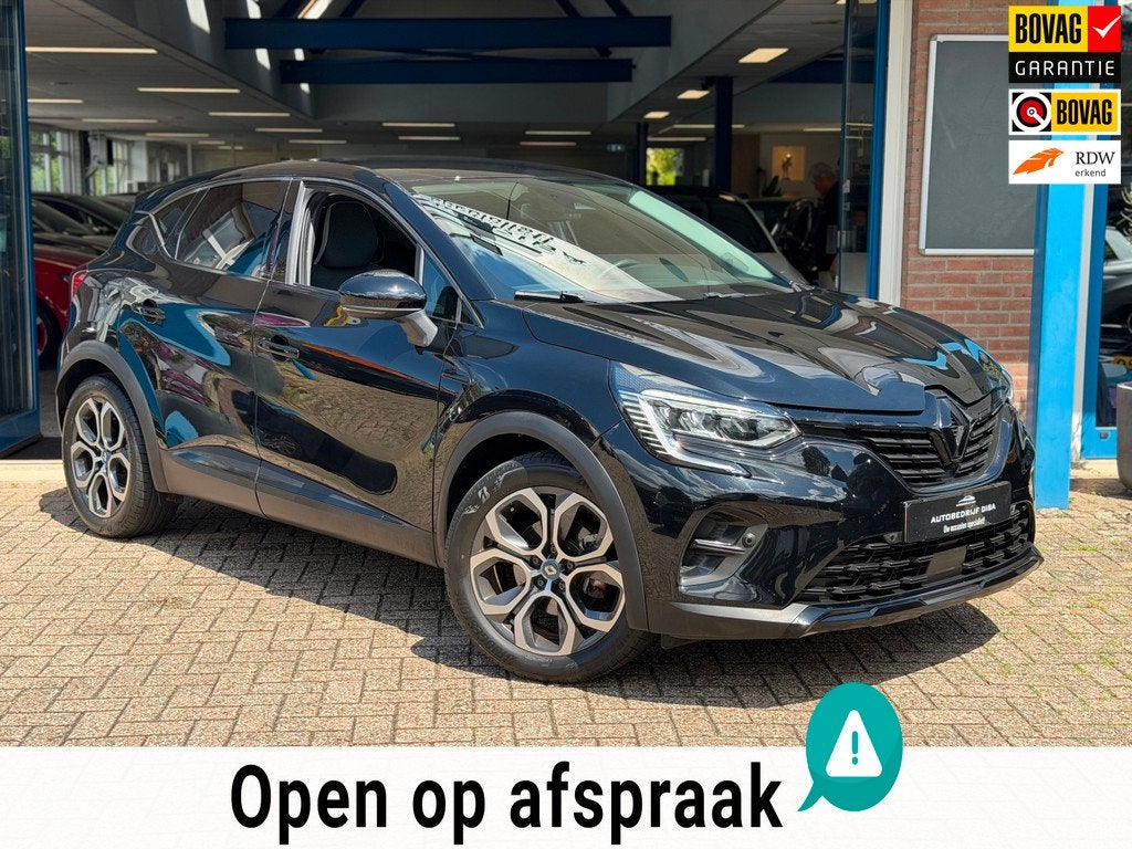 Renault Captur 1.6 E-Tech Hybrid 145 Intens AUT NAVI NAP!, Auto's, 94 pk, Stof, Gebruikt, 715 kg