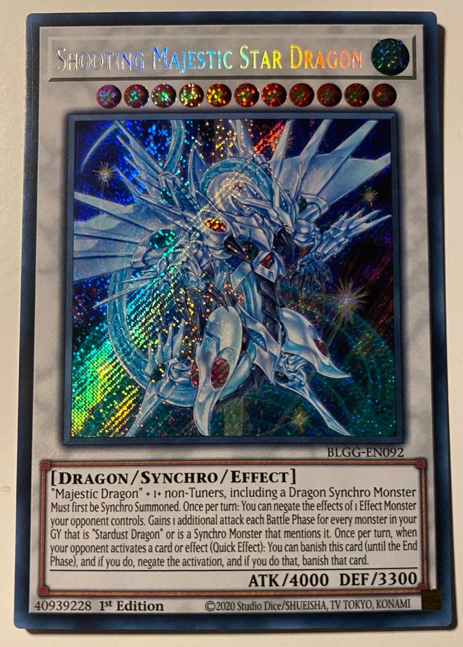 Yu-Gi-Oh! Shooting Majestic Star Dragon BLGG 1st Edition !, Ophalen of Verzenden, Zo goed als nieuw, Losse kaart, Foil
