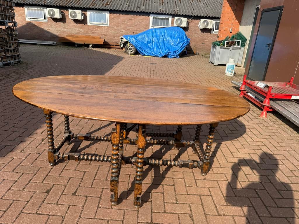 Antieke eiken gate leg tafel met 6 smokers bow stoelen, Ophalen of Verzenden