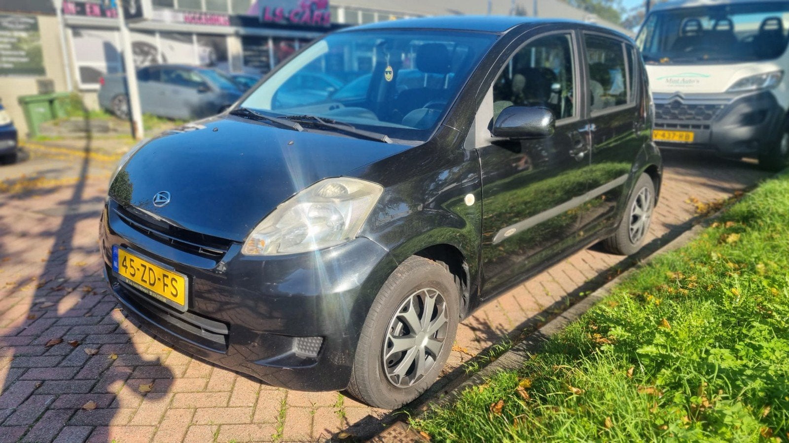 Daihatsu Sirion 1.0 51KW 2008 Zwart, Auto's, Voorwielaandrijving, Stof, Zwart, Handgeschakeld