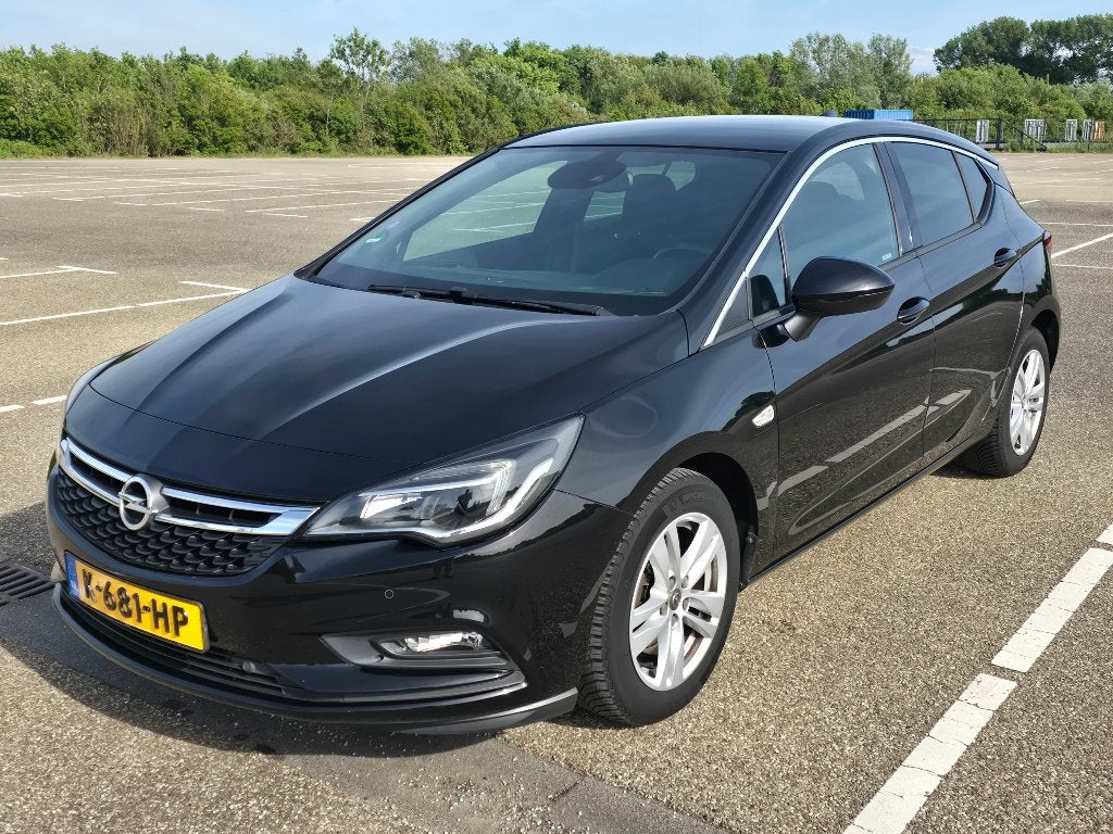 Opel Astra 1.4 Turbo Innovation Sport 92KW 5D 2018 Zwart, Auto's, 1550 kg, 4 cilinders, 620 kg, Zwart