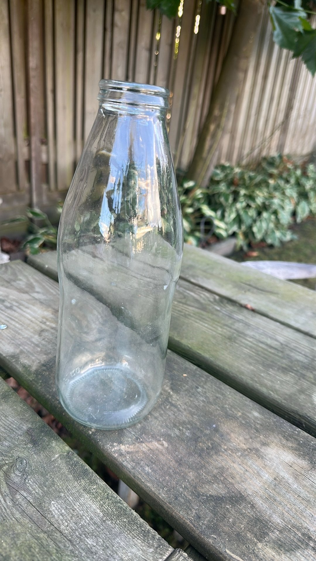Vintage glazen melkfles, Ophalen