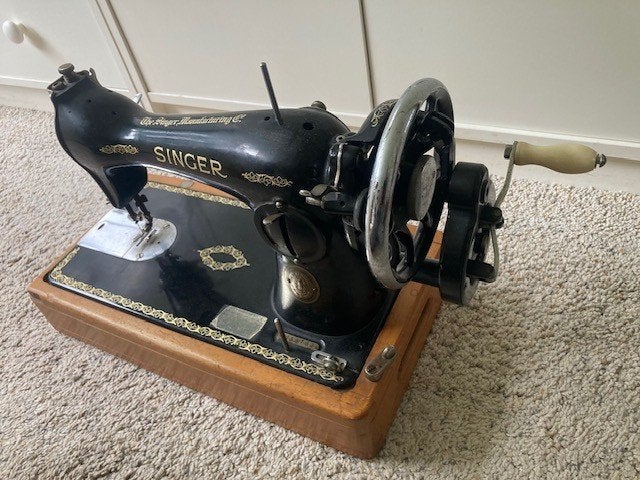 vintage SINGER naaimachine, Ophalen