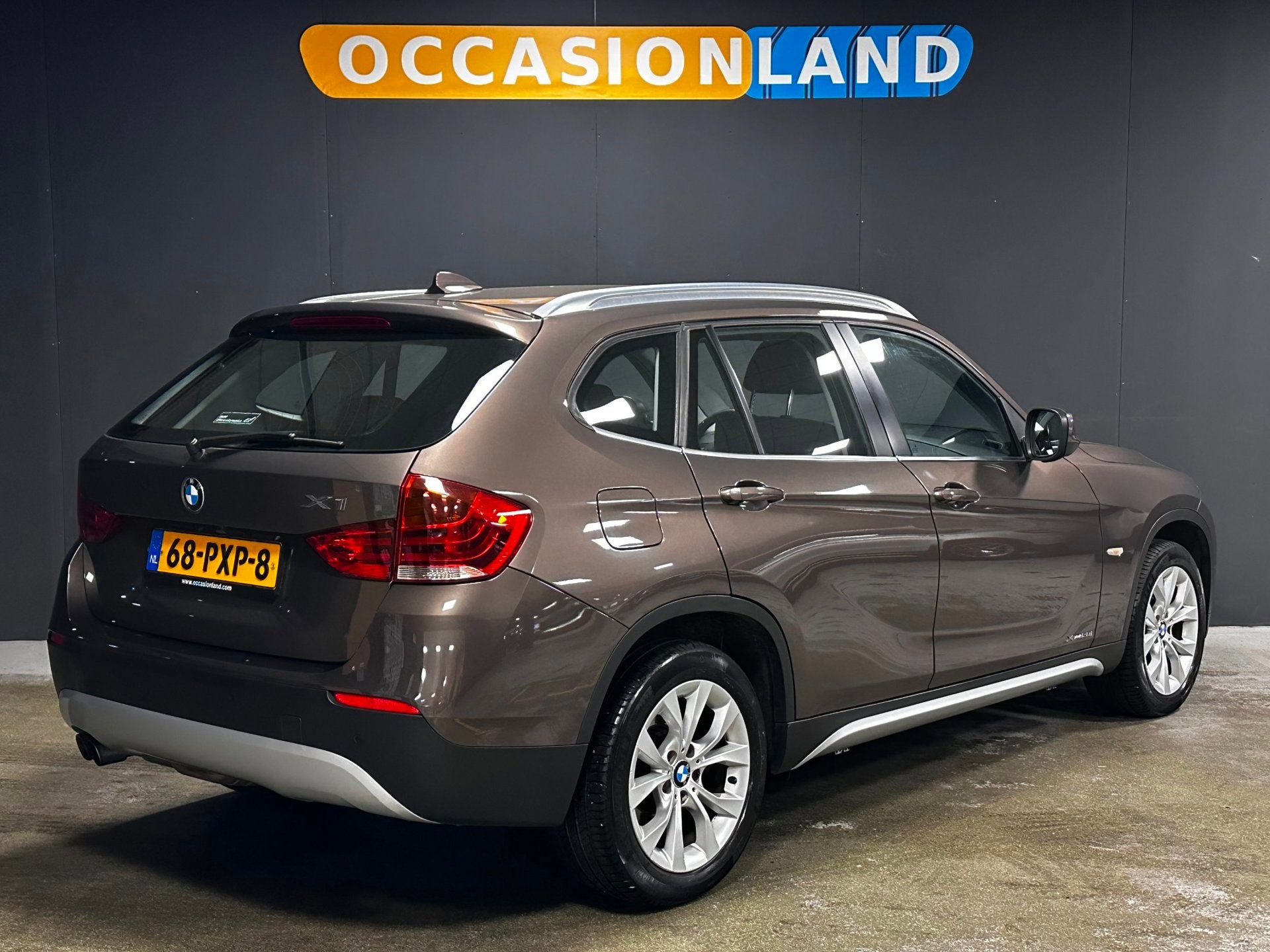 BMW X1 XDrive28i Executive|AUTOMAAT|CRUISE|BLUETOOTH|NAVI|CA, Auto's, BMW, Euro 5, Stof, Gebruikt, Zwart