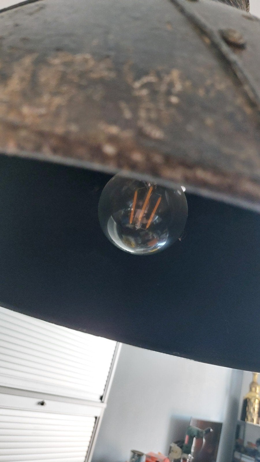 te koop industriële lamp, Ophalen