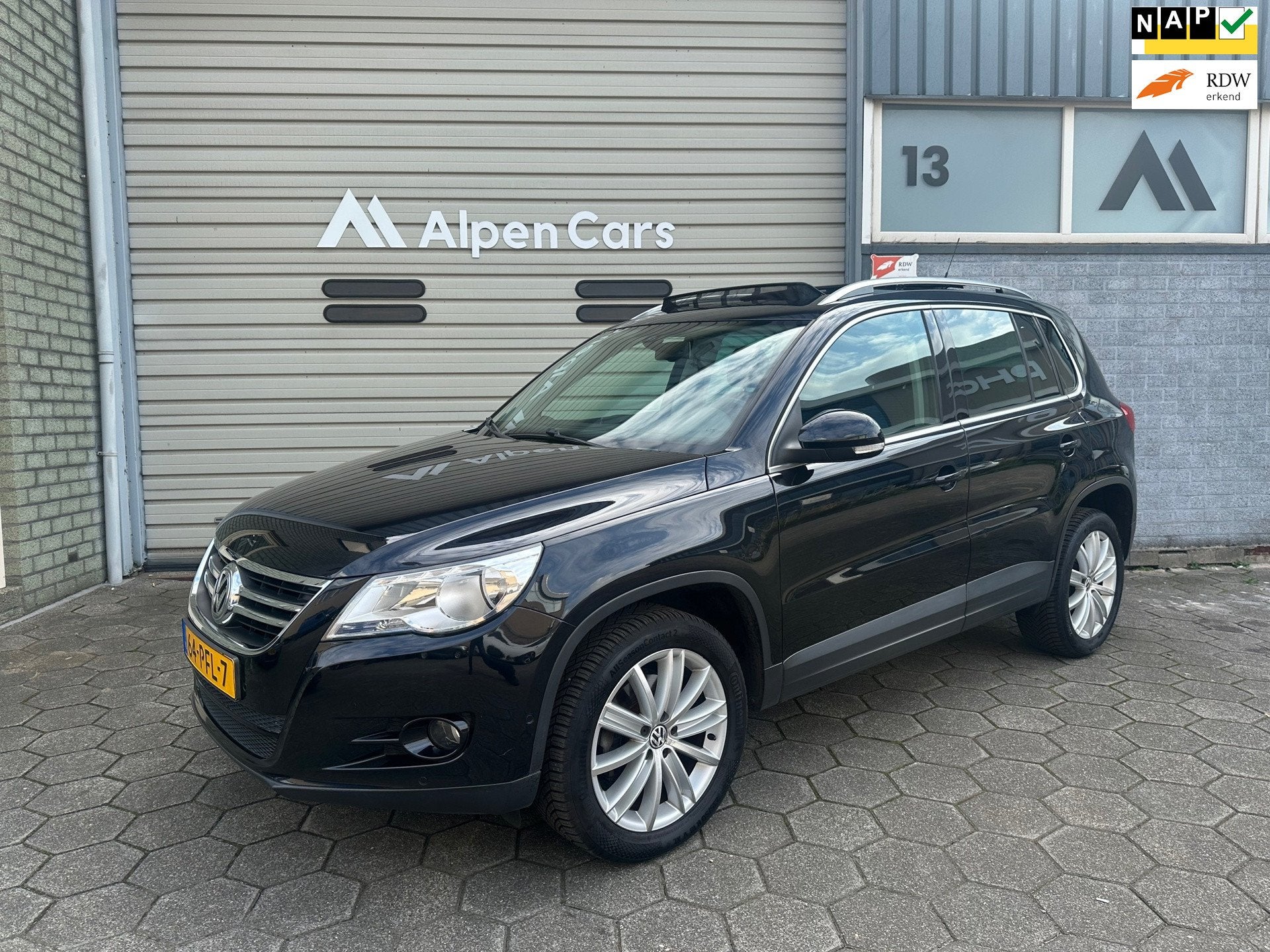 Volkswagen Tiguan 1.4 TSI Sport&Style Eerste eigenaar / Pano, Auto's, Voorwielaandrijving, 4 cilinders, 150 pk, Zwart