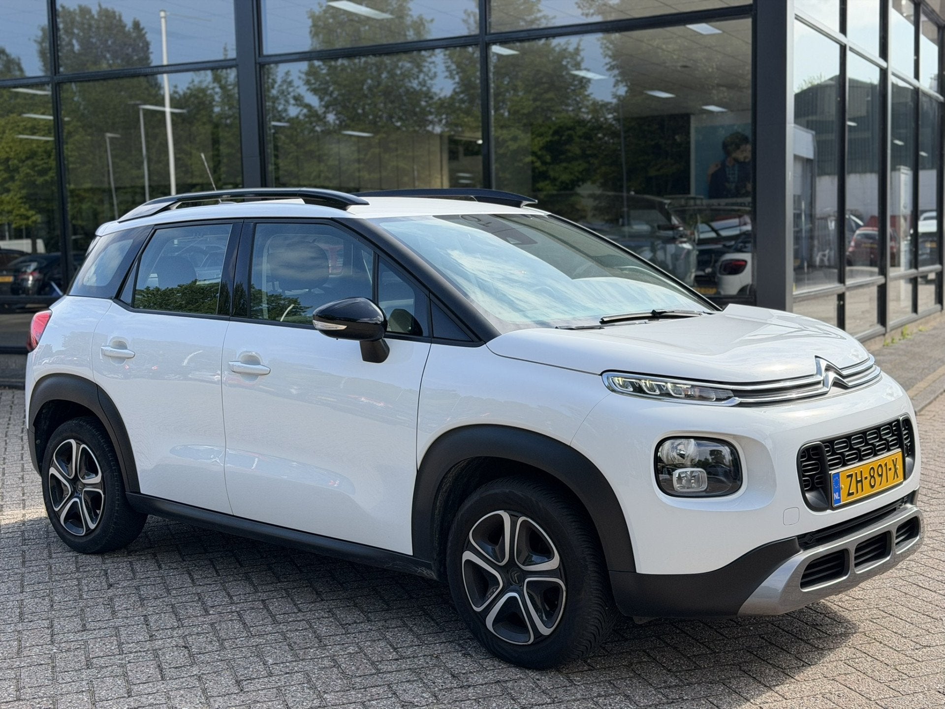 Citroën C3 Aircross 110pk S&S Feel Navigatie|Airco|HogeZit, Gebruikt, 1199 cc, Wit, Origineel Nederlands