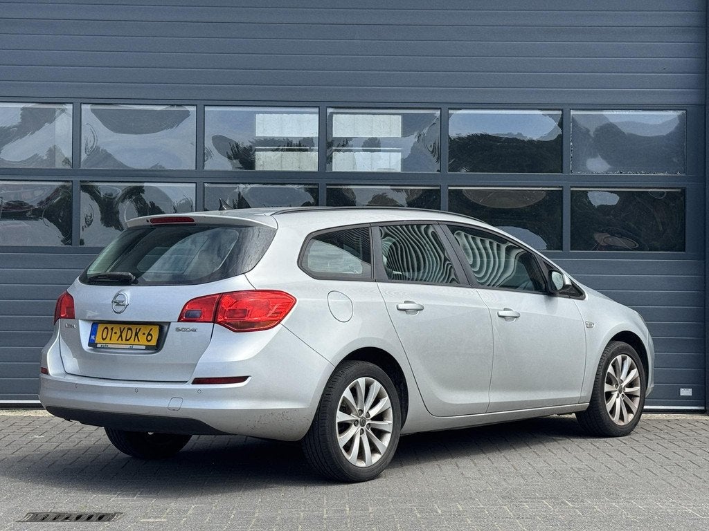 OPEL ASTRA SPORTS TOURER 1.4 ANNIVERSARY EDITION I MEENEEMPR, Voorwielaandrijving, Gebruikt, 4 cilinders, Origineel Nederlands