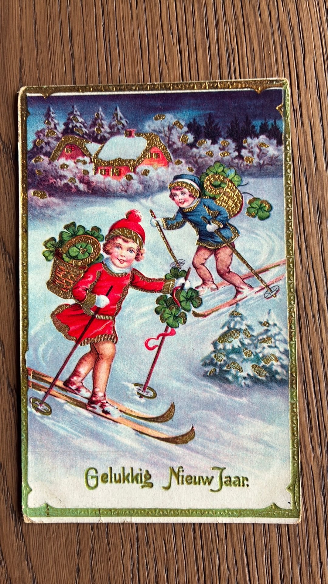 Kinderen op de ski met mand klaver. Goudopdruk., Ophalen of Verzenden, Gelopen, Kinderen