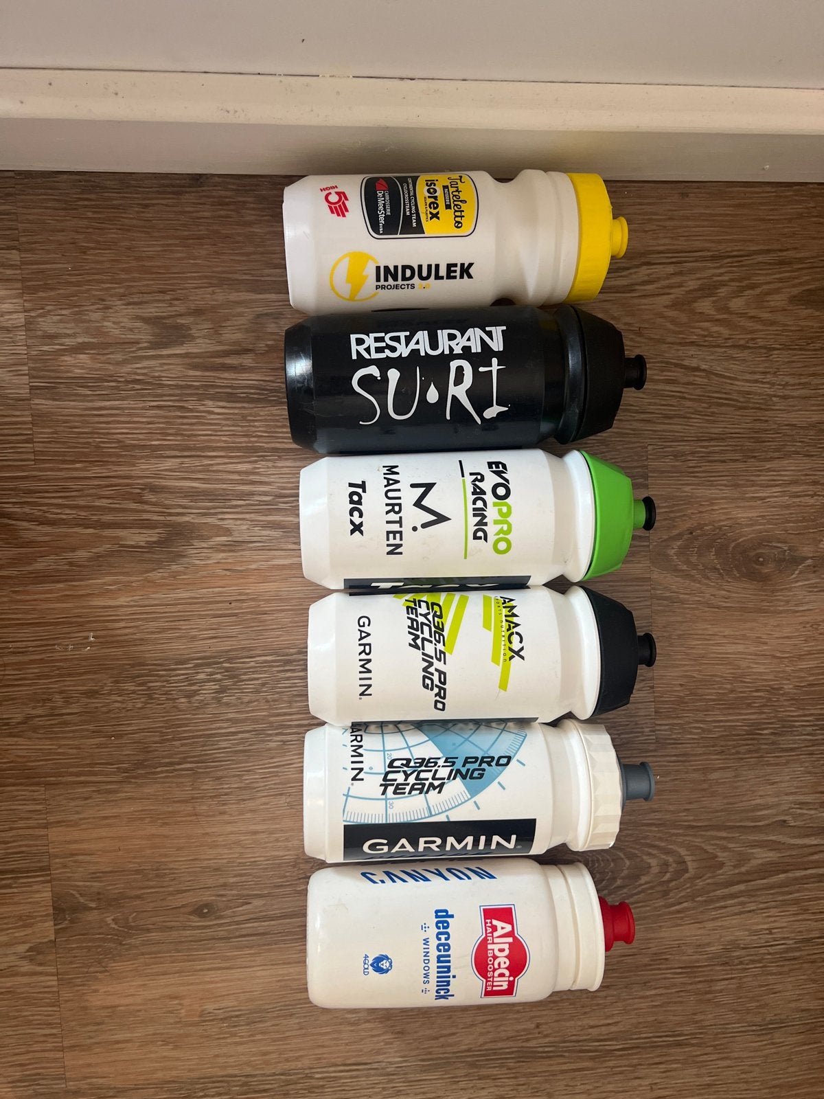 Set van 6 diverse bidons van professionele wielerteams, Ophalen of Verzenden, Gebruikt
