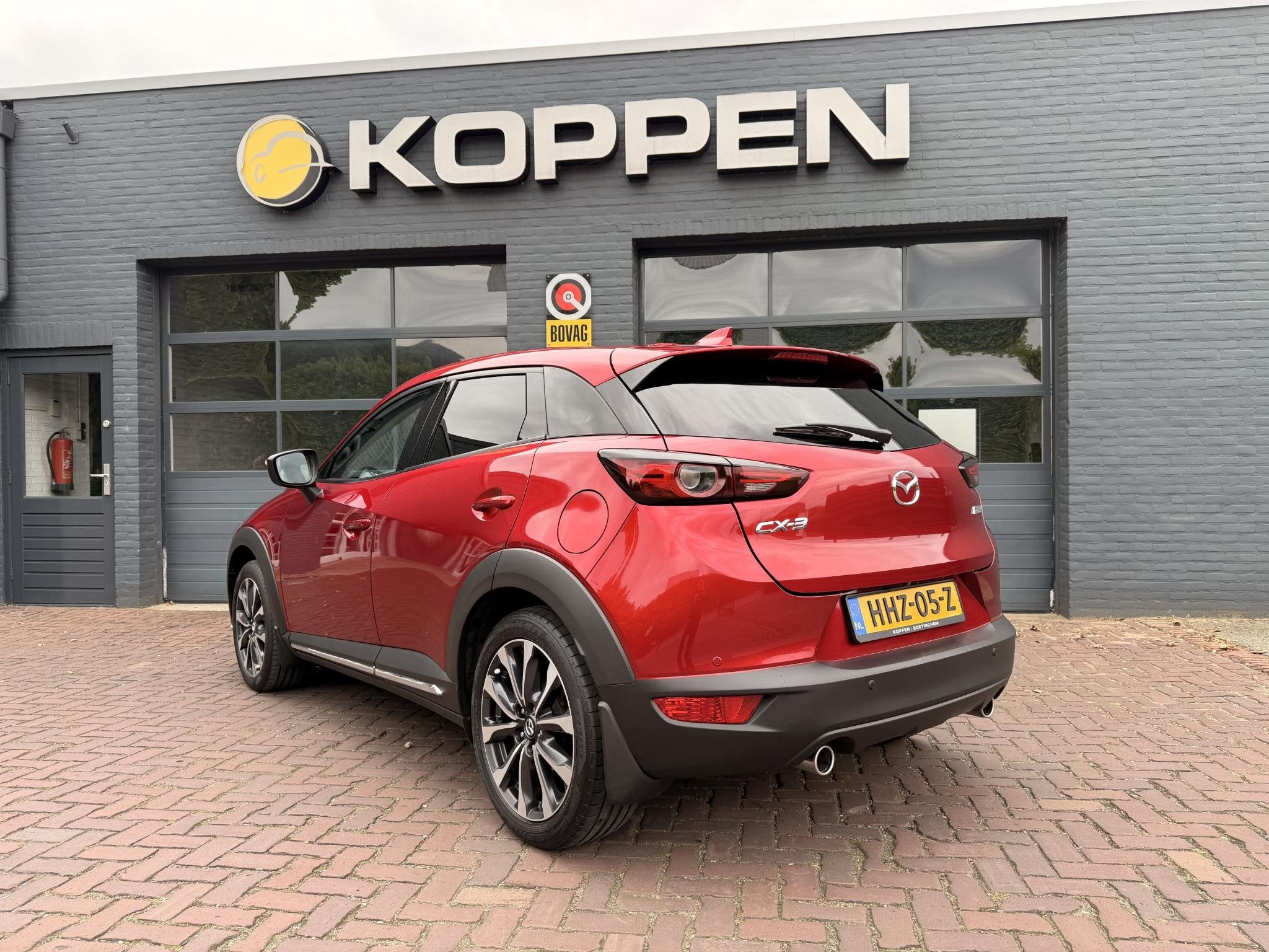 Mazda CX-3 2.0 SkyActiv-G 120 GT-M Automaat, Auto's, Gebruikt, 4 cilinders, Leder en Stof, Automatische klimaatregeling
