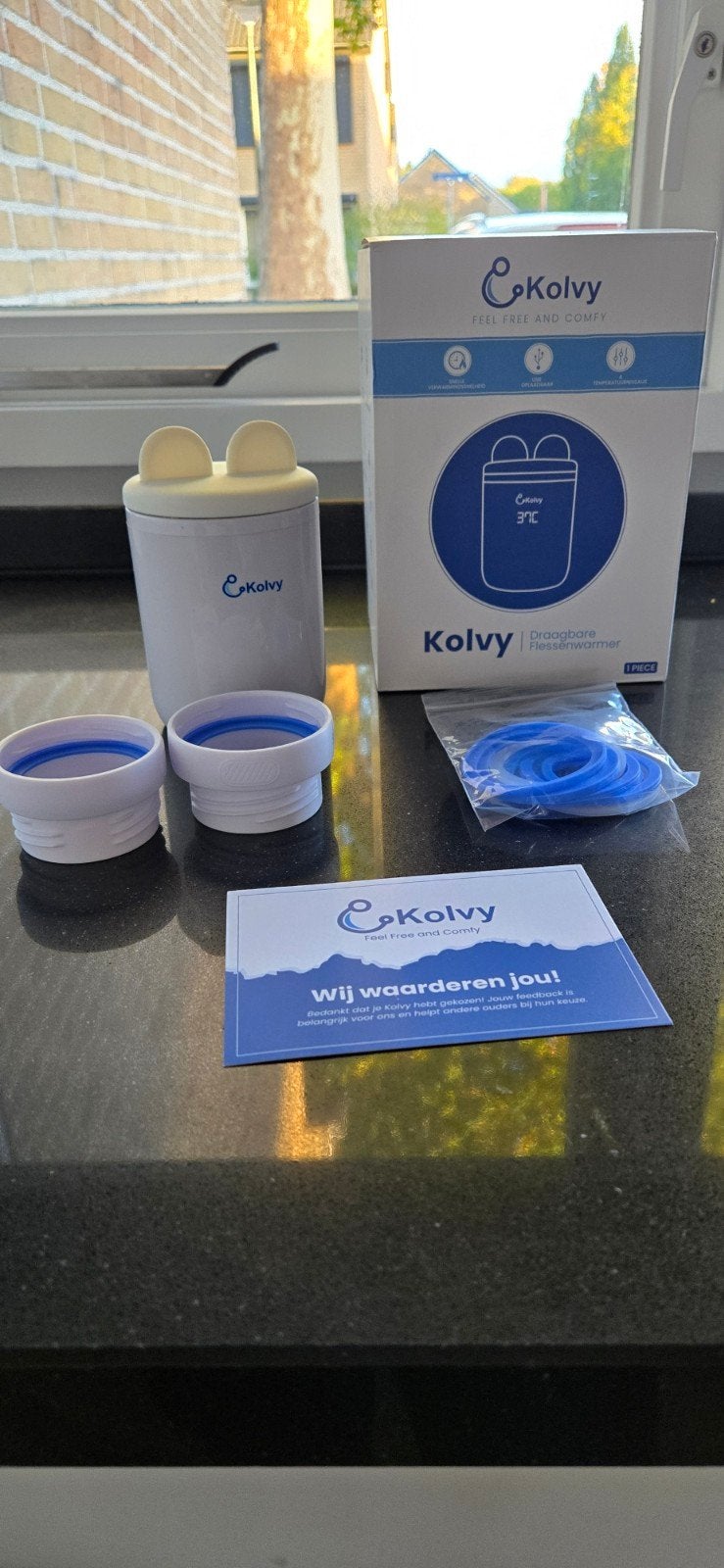 Kolvy Flessenwarmer - Draagbaar en Efficiënt, Draadloos, Ophalen of Verzenden, Zo goed als nieuw, Flessen- of potjesverwarmer