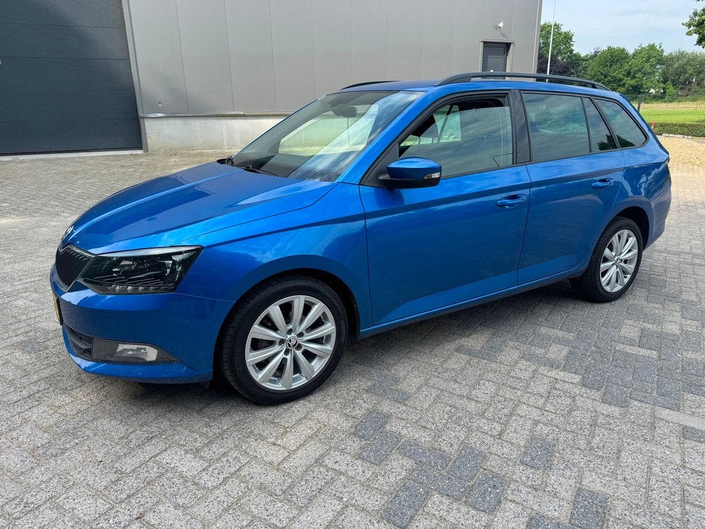Skoda Fabia Combi 1.2 TSI Style Keyless Start KM NAP APK, Stof, 4 cilinders, Blauw, Origineel Nederlands