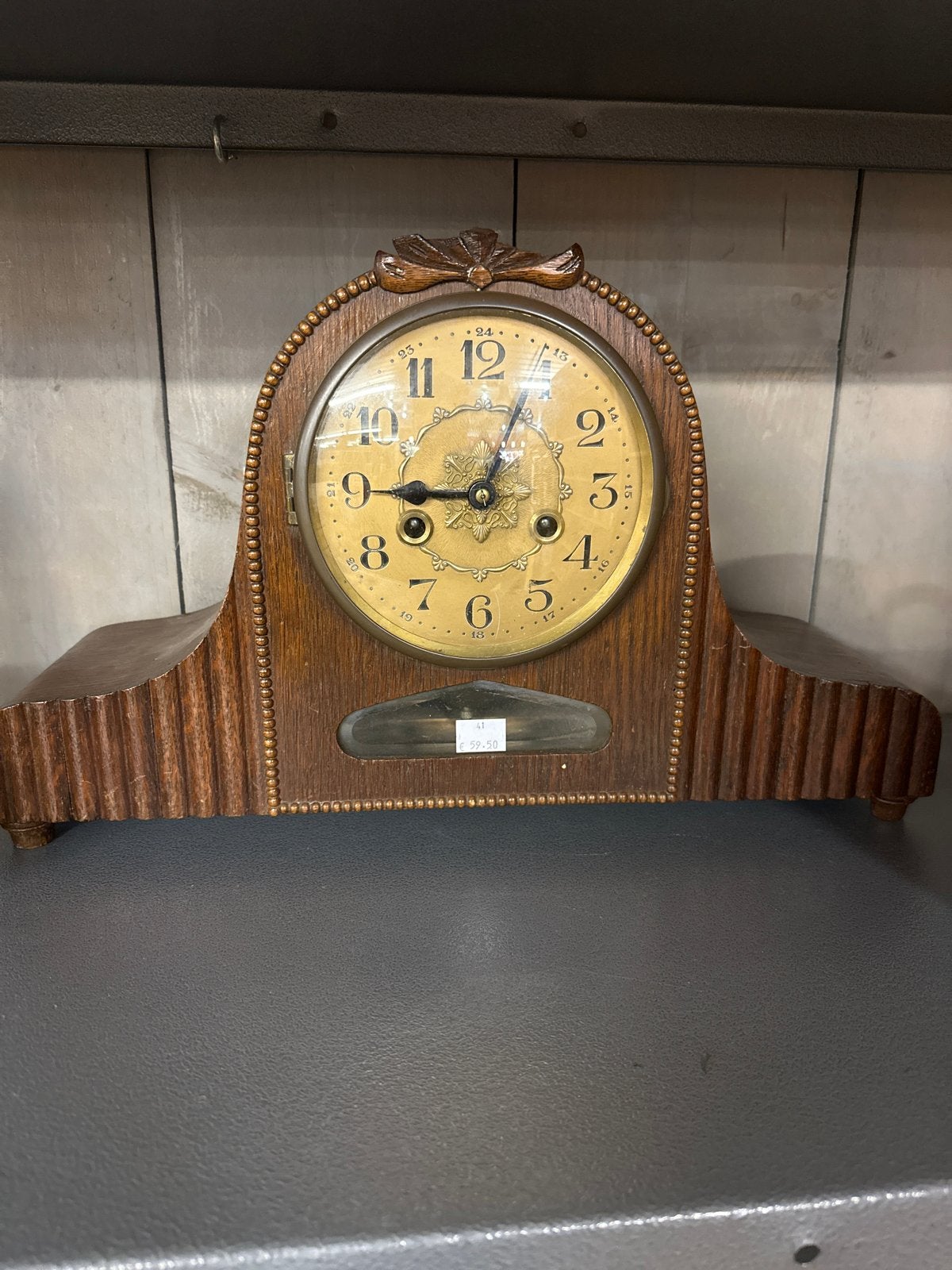 Antieke houten tafelklok, Ophalen