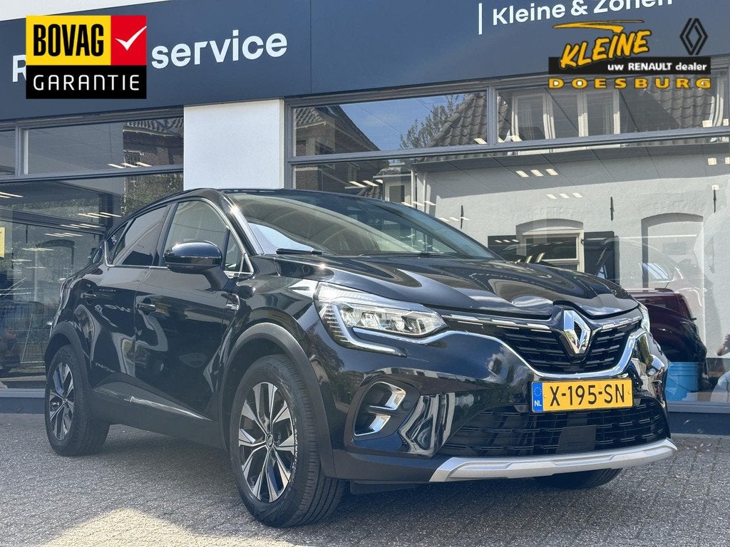 Renault Captur 1.6 E-Tech full hybrid 145 techno | Easylink, Gebruikt, 715 kg, Leder en Stof, Zwart