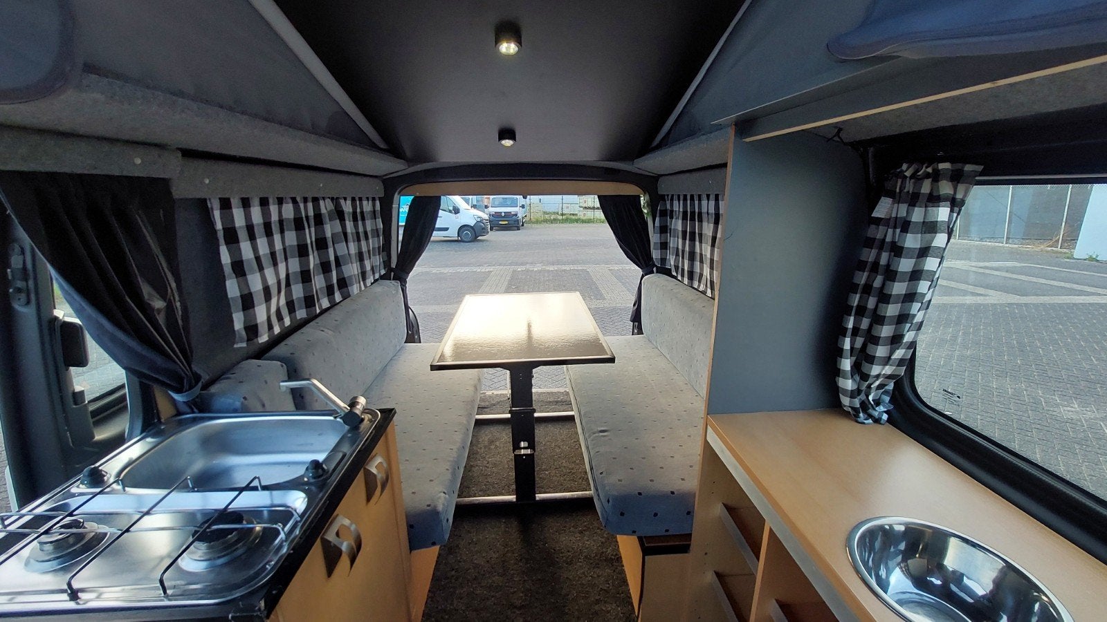 Foto 8 van VW T5 REIMO # 6 ZIT+4 SLAAPPLAATSEN # SLAAPHEFDAK #LENGTEZIT