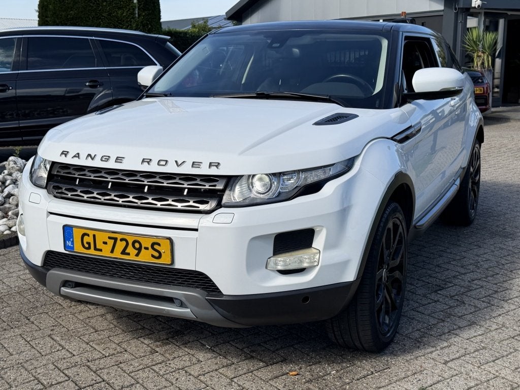 Land Rover Range Rover Evoque Coupe 2.0 SI Benzine 4WD Prest, Auto's, Automaat, Euro 5, Zwart, 4 cilinders