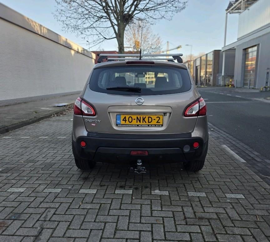 Nissan Qashqai 1.6 2WD (2010) – Bruin – NAP aanwezig, Auto's, Nissan, Voorwielaandrijving, 15 km/l, Adaptive Cruise Control, 4 cilinders