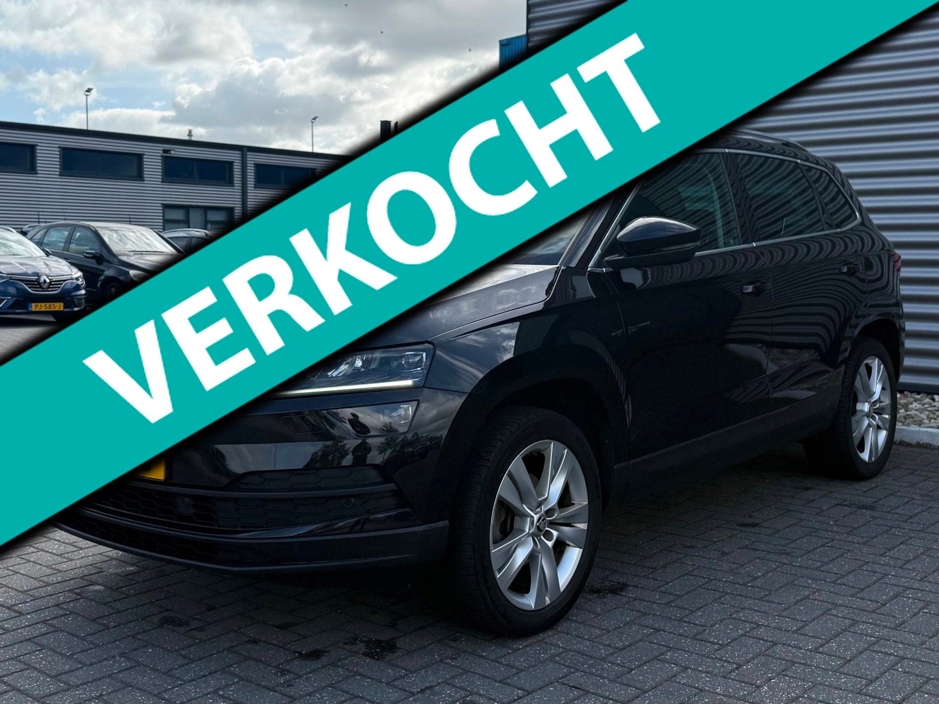 Skoda Karoq 1.0 TSI Style Business, Auto's, Gebruikt, 1261 kg, 116 pk, Zwart