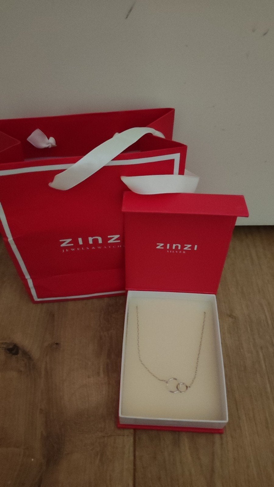 Zinzi ketting, Ophalen, Zo goed als nieuw