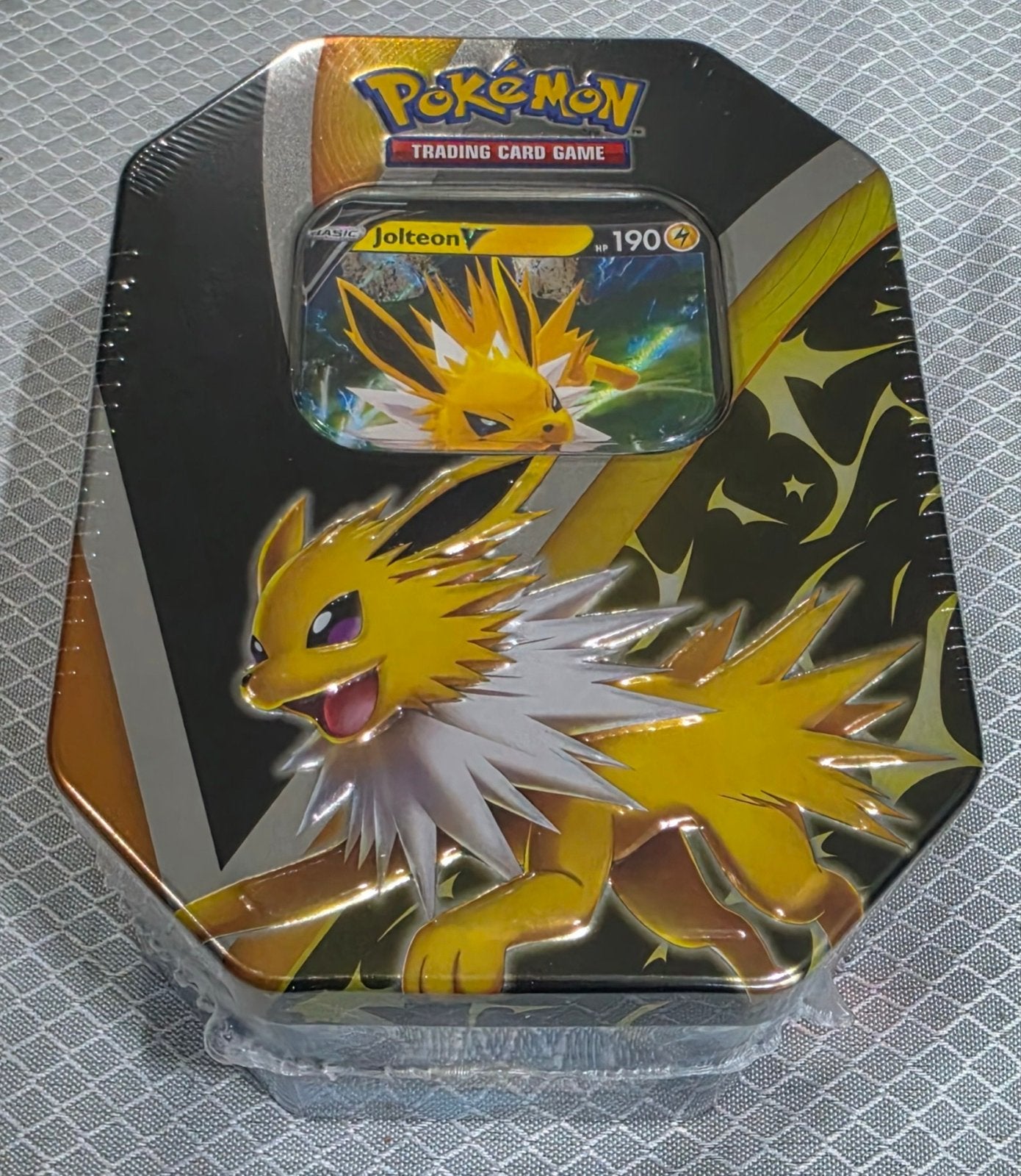 Pokémon TCG: Eevee Evolutions Tin - Jolteon V (Nieuw), Ophalen, Nieuw, Overige typen, Foil