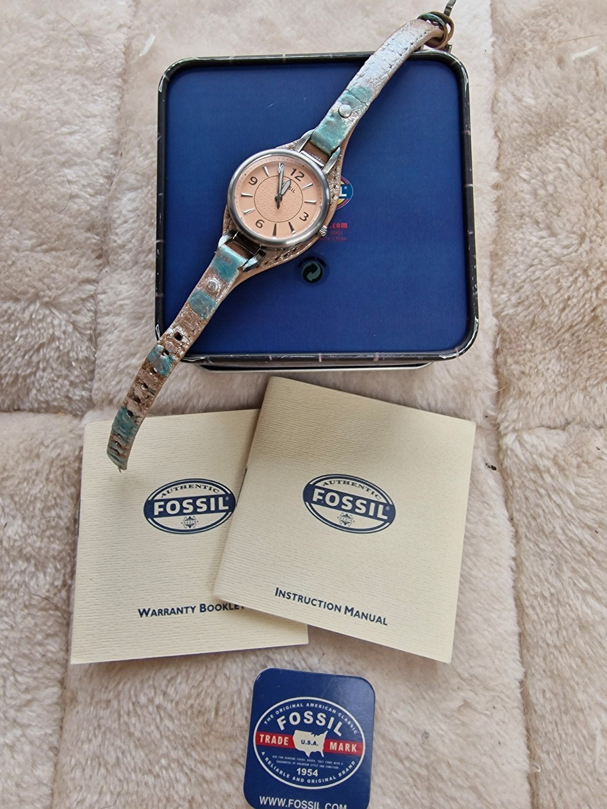 Fossil horloge met blikje en boekjes (lopend), Gebruikt, Staal, Fossil, Polshorloge