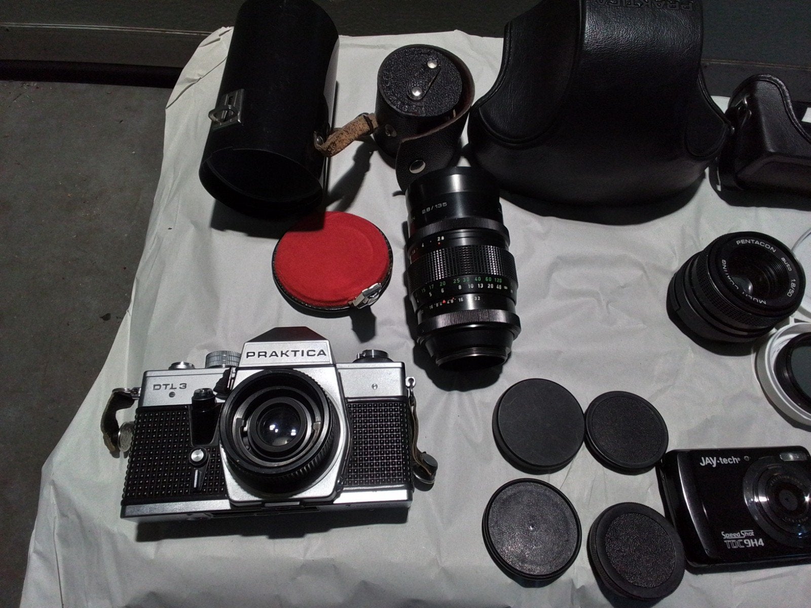 Praktica DTL3 Spiegelreflexcamera met accessoires, Ophalen