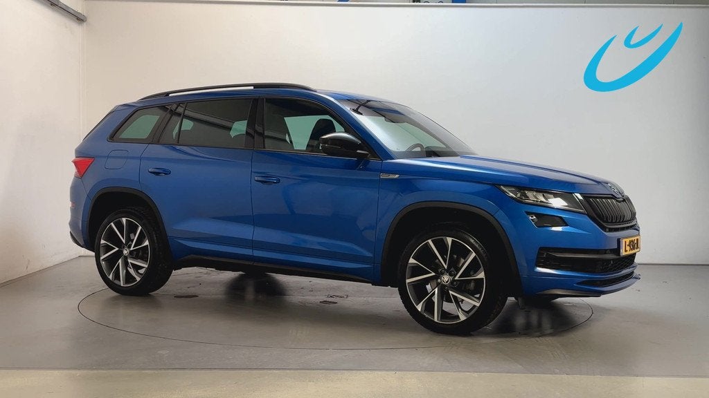 Skoda Kodiaq 1.5 TSI 150pk DSG Sportline Business Panoramada, Auto's, Skoda, 4 cilinders, Blauw, Origineel Nederlands, Bedrijf