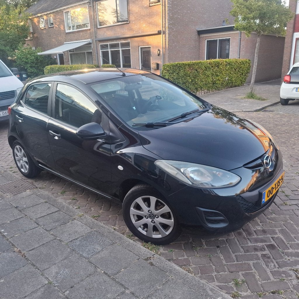 Mazda 2 1.3 Bifuel 75pk 5D 2012 Zwart, Voorwielaandrijving, Euro 5, 4 cilinders, Zwart