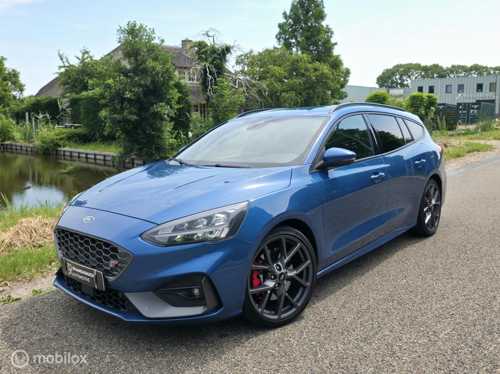 Ford Focus Wagon 2.3 EcoBoost ST-3 / B&O / Carplay / Camera, Auto's, Gebruikt, 4 cilinders, Blauw, Automatische klimaatregeling