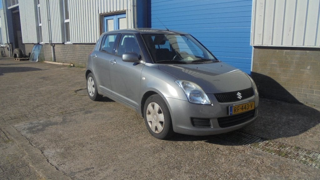 Suzuki Swift 1.3 5D 2009 Grijs APK 12.08.2027, Auto's, Voorwielaandrijving, 40 €/maand, 400 kg, Swift