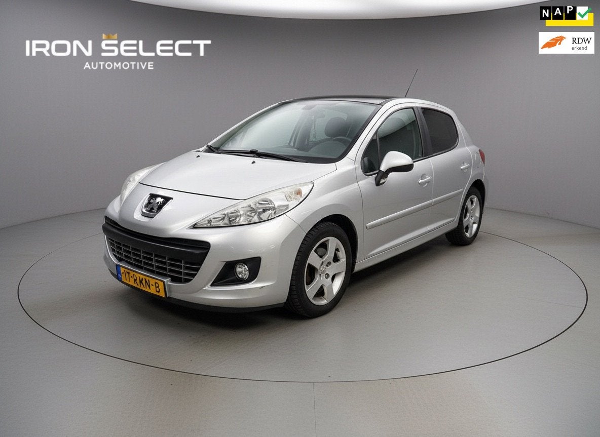Peugeot 207 1.6 VTi Allure, Auto's, Voorwielaandrijving, Euro 5, Gebruikt, Leder en Stof