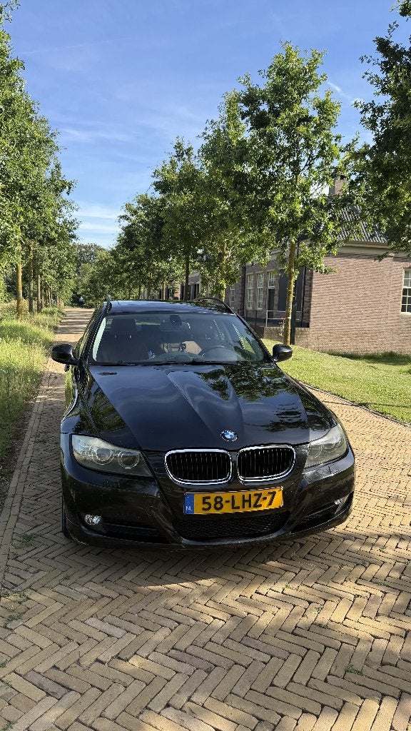 BMW 3-Serie 2.0 I 320 Touring AUT 2009 Zwart, Automaat, Achterwielaandrijving, 1995 cc, 4 cilinders