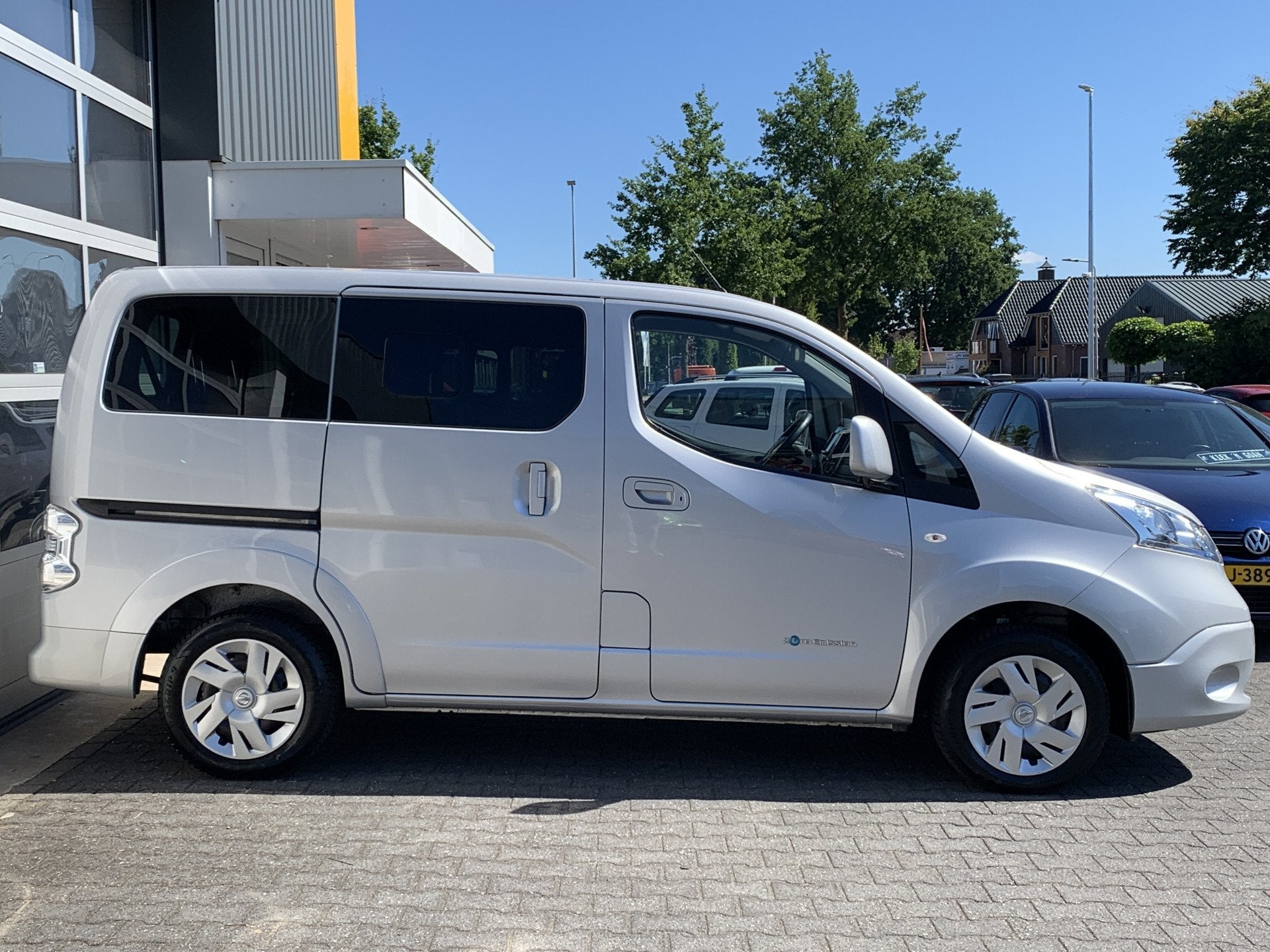 Nissan E-NV200 80KW 24 kWh Evalia 7-persoons Climate control, Auto's, Stof, Gebruikt, Zwart, 1514 kg