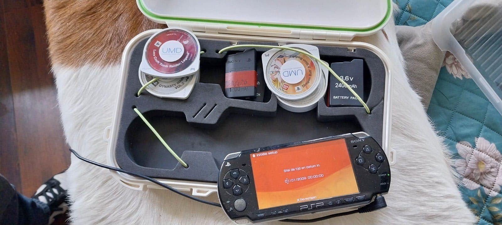 Sony PSP met 10 UMD games, 2 accu's en oplader, Ophalen of Verzenden