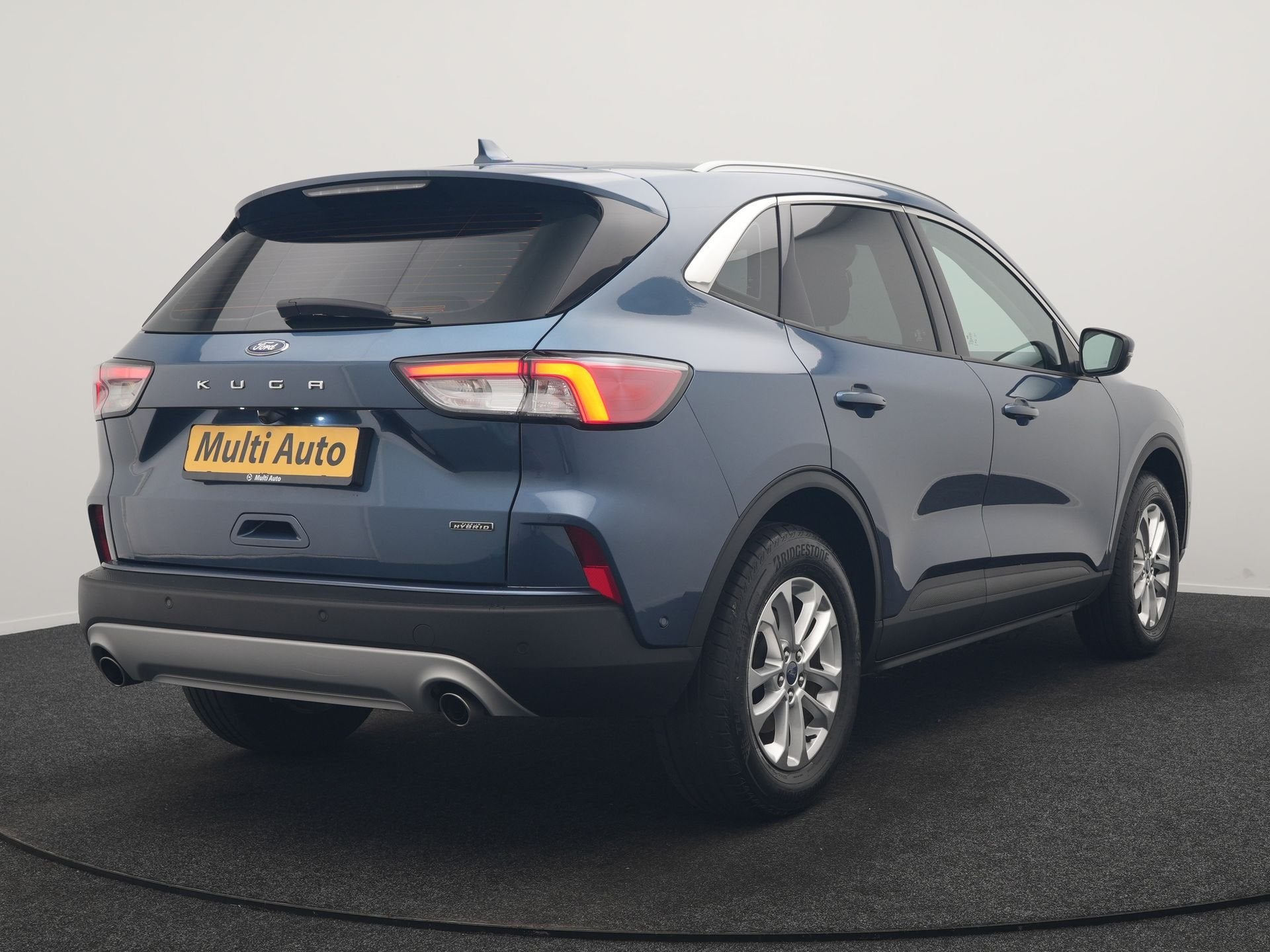 Ford Kuga 2.5 PHEV Titanium 225pk Dealer O.H | Adaptive Crui, Auto's, Ford, Stof, Gebruikt, Zwart, 4 cilinders