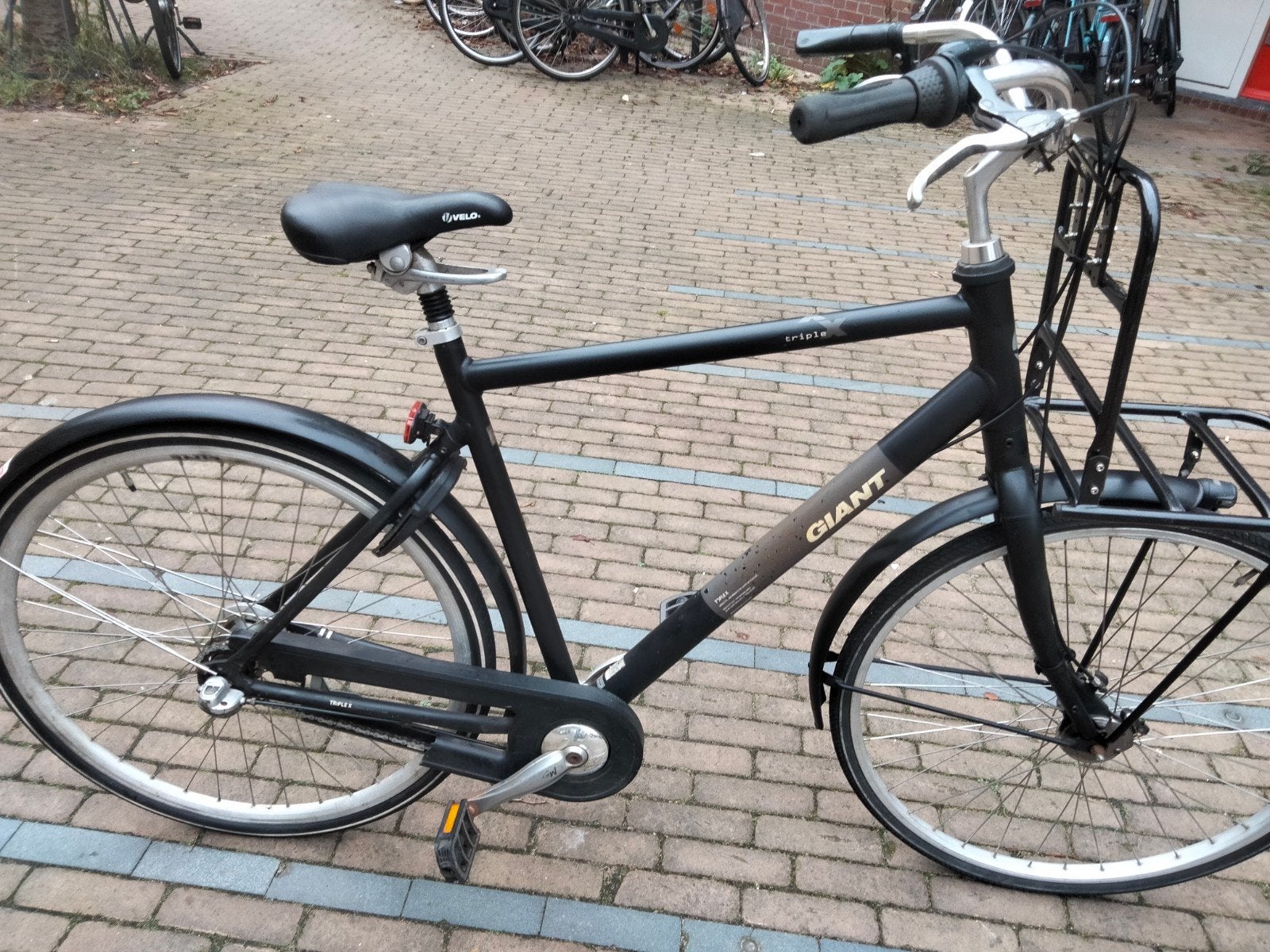 Giant Triple X herenfiets 28 inch, Fietsen en Brommers, Ophalen, Gebruikt, Velgrem, Versnellingen