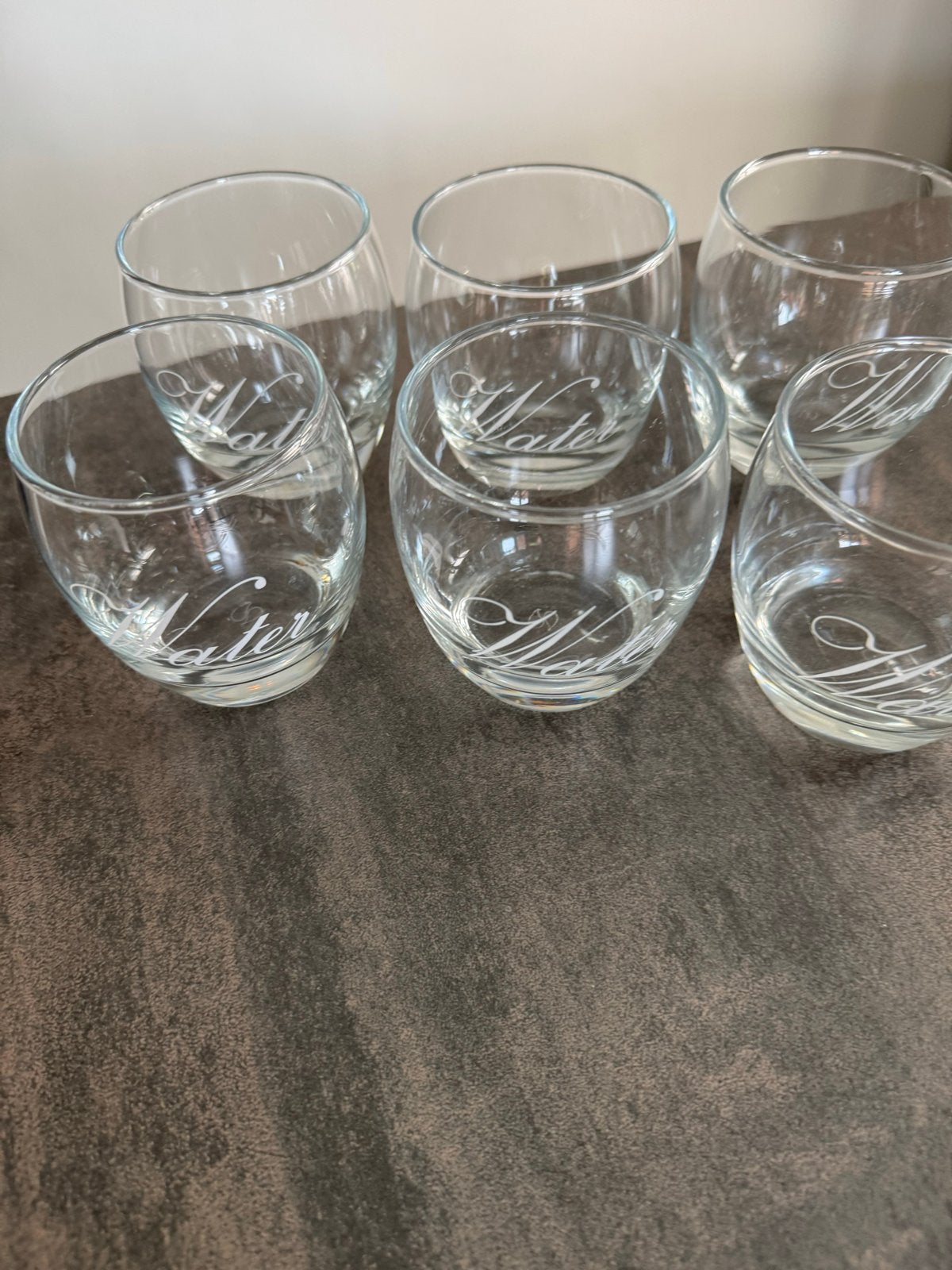 Set van 6 waterglazen met 'Water' opdruk, Ophalen