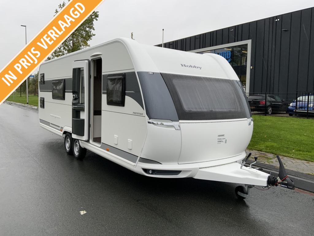 Hobby Prestige 650 Kfu 2e Pinksterdag open, Caravans en Kamperen, Schokbreker, Rondzit, 7 tot 8 meter, Bedrijf