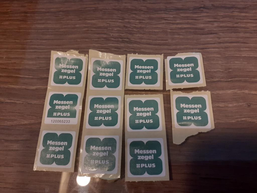 11 messenzegels van de Plus, Verzamelen, Plus, Ophalen of Verzenden